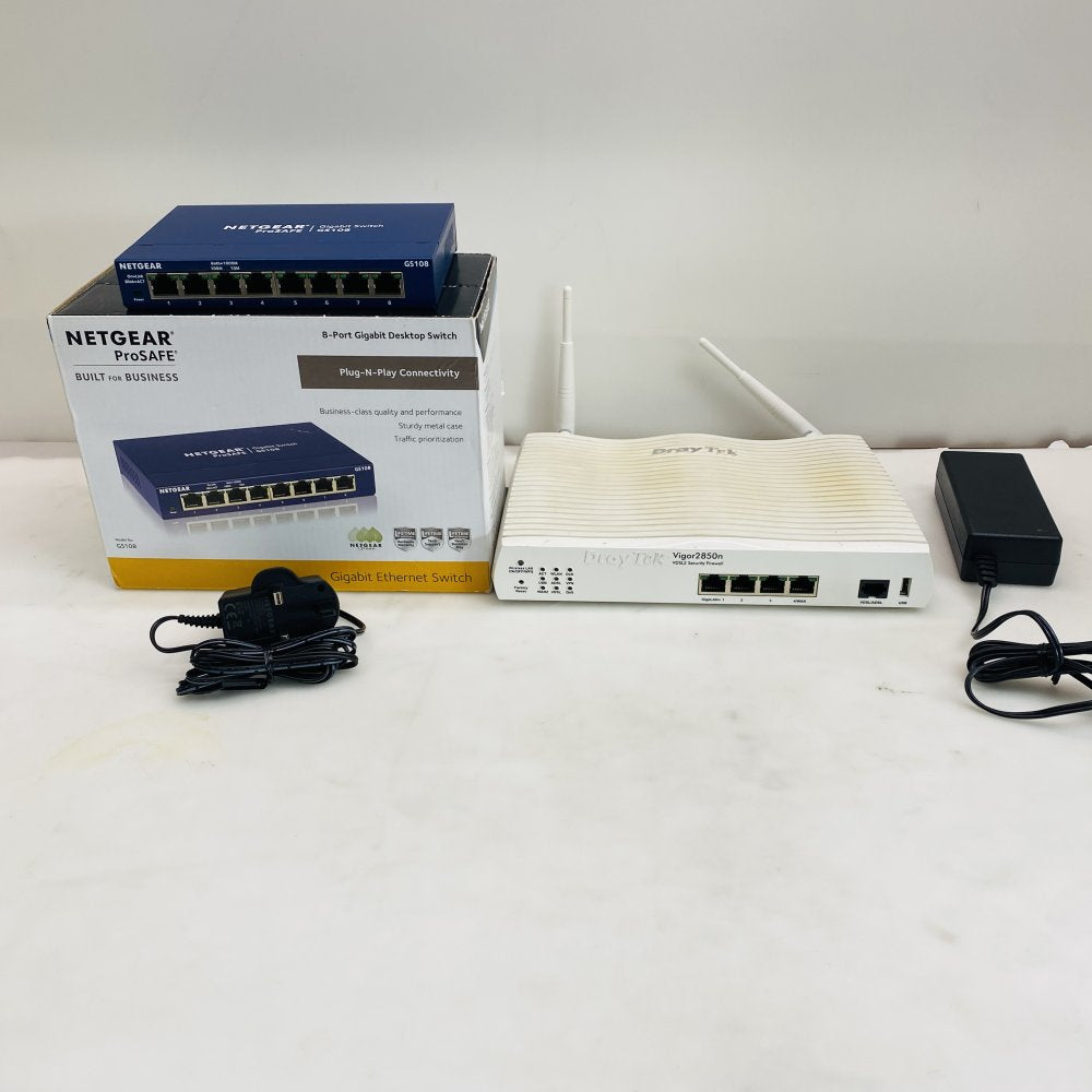 NETGEAR ProSAFE GS108 8-Port Gigabit Switch + DrayTek Vigor2850n Router Grade B