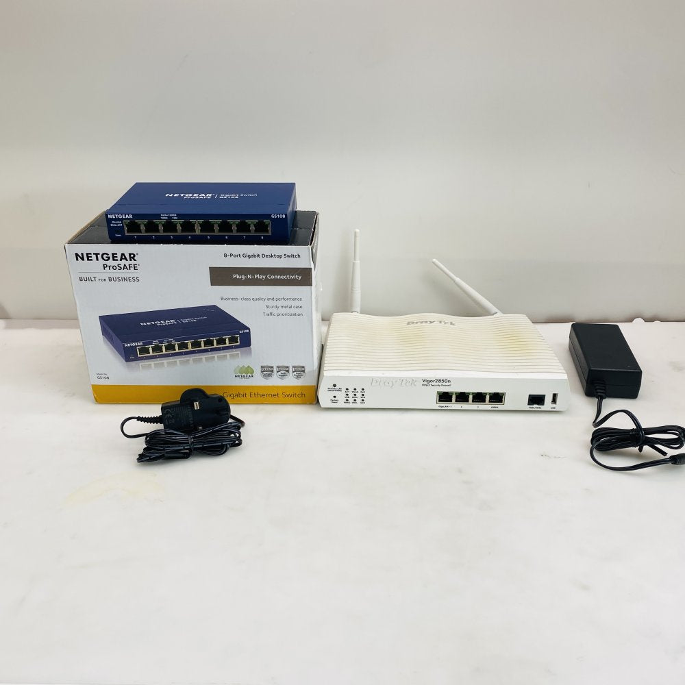 NETGEAR ProSAFE GS108 8-Port Gigabit Switch + DrayTek Vigor2850n Router Grade B